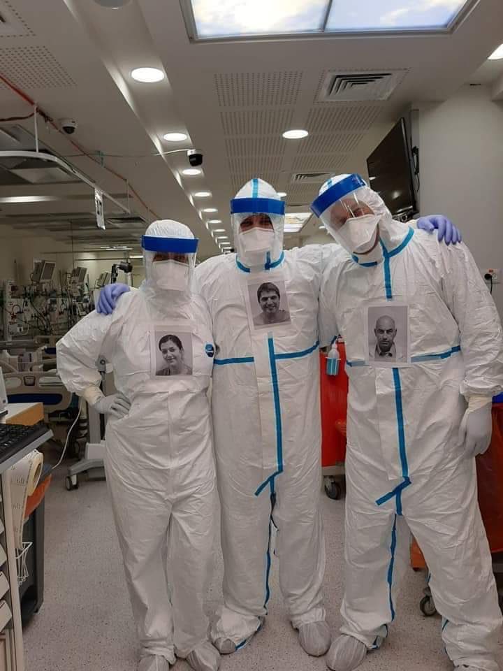 frlydensmith's tweet photo. These doctors have put their pictures on their Protective suits so that their #coronavirus patients can see who is looking after them, this is such a nice idea ☺️ https://t.co/2Cj1Mag4Uk