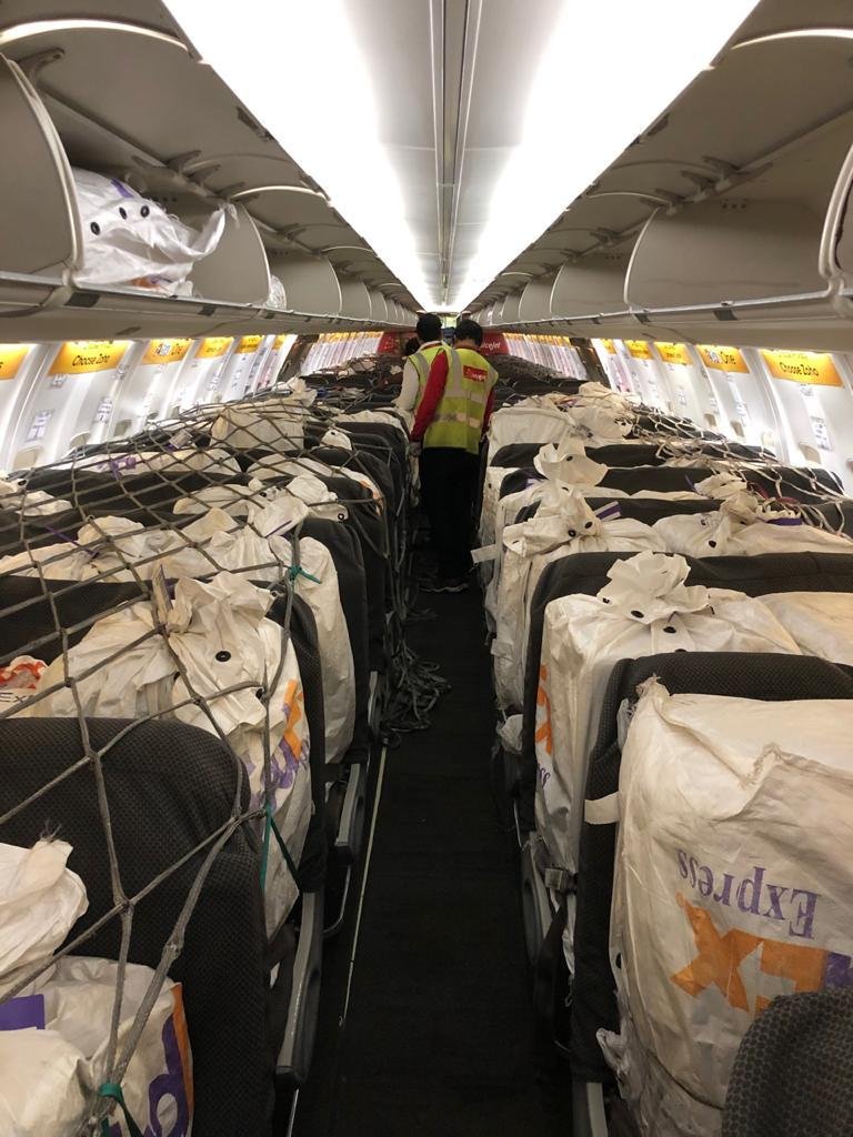 ANI's tweet photo. SpiceJet operated India’s first cargo-on-seat flight, carrying 11 tons of vital supplies in passenger cabin &amp; belly space from Delhi to Chennai. B737 passenger aircraft to do five rotations today carrying crucial supplies: SpiceJet #CoronaLockdown #COVID19 https://t.co/ZVy867s3af