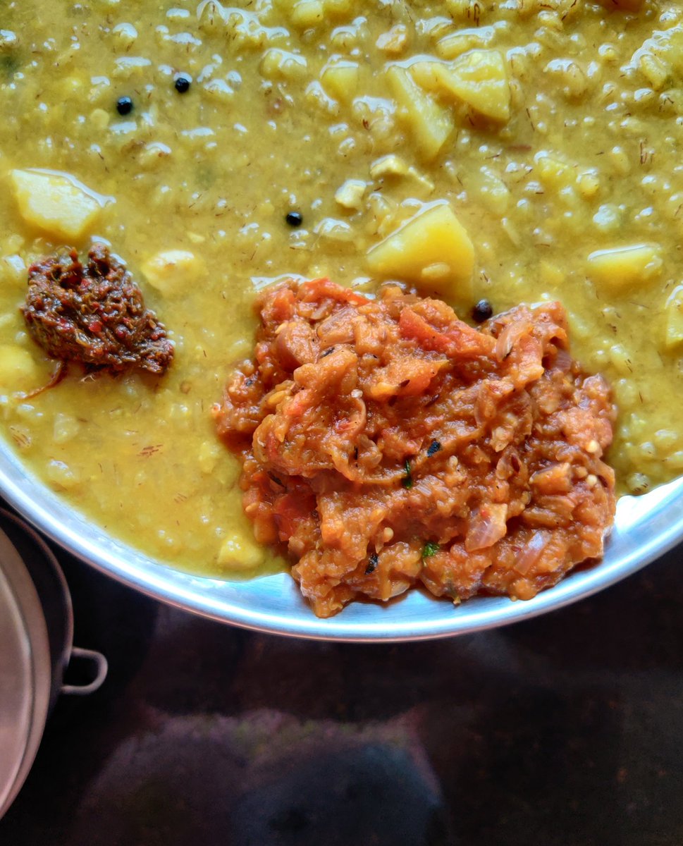 I had a really late lunch today because I had the easy-peasy best comfort food. Dal khichdi, bhaingan bharta and gongura pickle (store brought).  #QuarantineCooking