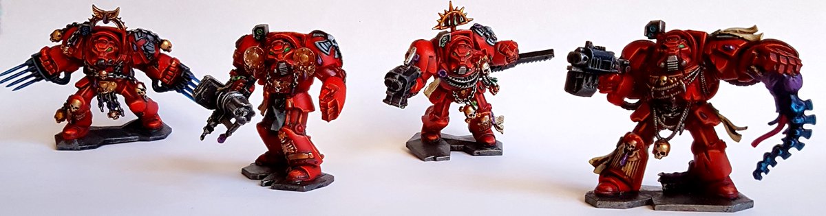 So, wedging the camera to steady it, tried again. The software did all the work in about a minute. Looks okay - any softness now if a fundamental limit of my camera (phone) optics and my limitations as a painter. But, all squad members and their genestealer mascot now in focus.