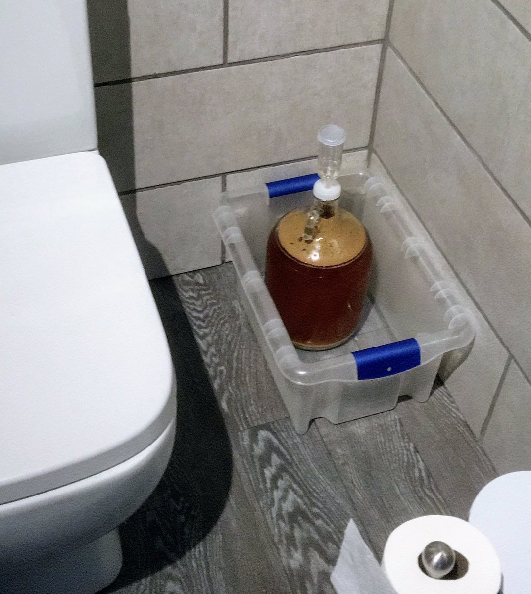 Tombry94's tweet photo. Brewing beer in a one bed apartment isn’t ideal but you have to make full use of the space. Its going to need a name when I bottle it, my best so far is D-I-pee-A. Open to suggestions #homebrew #beer #IsolationLife  #isolationbeer https://t.co/loNTUz4iq9