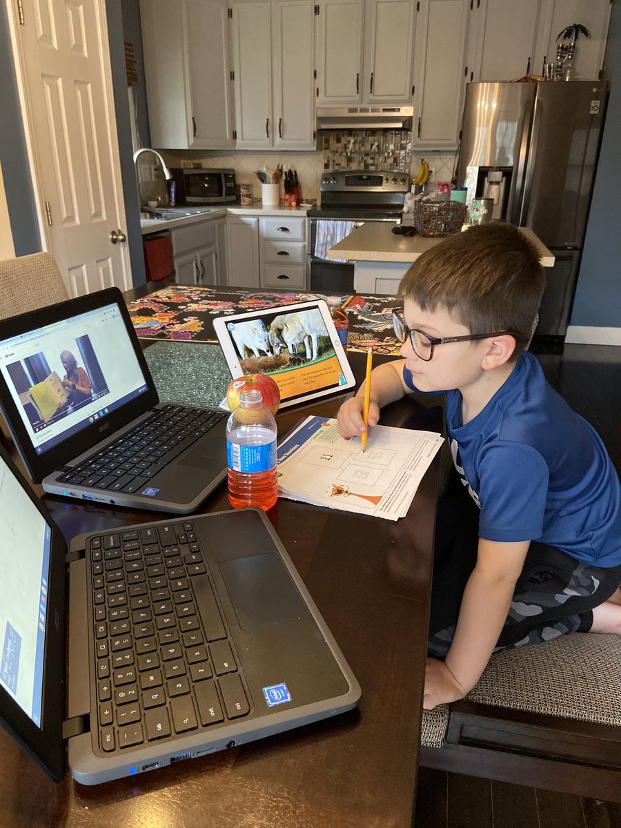 1st day of e-learning! This is tri-screen mode. Running: Google Classroom, Airoldi read aloud, Khan Academy, iReady Math. Additions of an apple, learning fuel(juice), 1500 piece puzzle. Wesley doesn’t wear glasses but, Hey, we staged this photo so he had to look the part <a href="/GtePto/">GTE PTO</a>