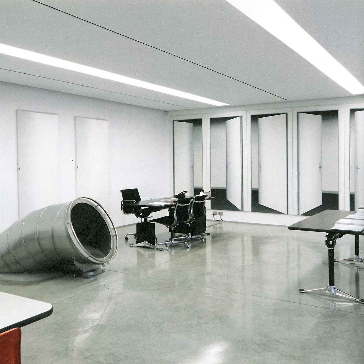 StreetFashion01's tweet photo. Miuccia Prada has a Slide that takes her from her top floor office all the way down to the ground floor. Now that’s iconic. https://t.co/Z0dPLKvSMu
