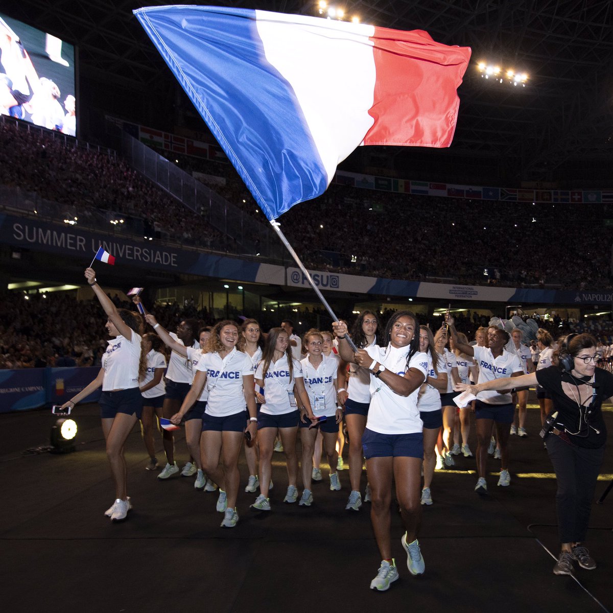 FFSportU's tweet photo. En cette période de #confinement, retour sur les temps forts du sport universitaire français en 2019.

 #FlashbackFFSU N°7 : deux jeunes femmes, @MBMeite et @IanouJason, sont les porte-drapeaux tricolores aux #Universiades d’hiver et d’été de #Krasnoyarsk2019 &amp; #Napoli2019 🇫🇷🇫🇷 https://t.co/2K9XbpFuK0