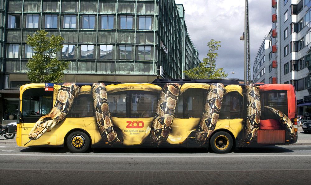 eawright's tweet photo. Some folks were so frightened by this bus (part of an ad campaign for the Copenhagen zoo) that they refused to board. https://t.co/szxN9ikSWU #snakebook https://t.co/OWh9XBrq8Z