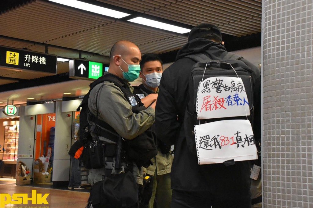 GlobalYJA's tweet photo. A black-clad man with simply a card saying “Give me the 8.31 truth” was searched by the #HKPolice for more than 20mins and subsequently arrested. And the police did not provide the reasons for the arrest. https://t.co/KahQskuHqA
