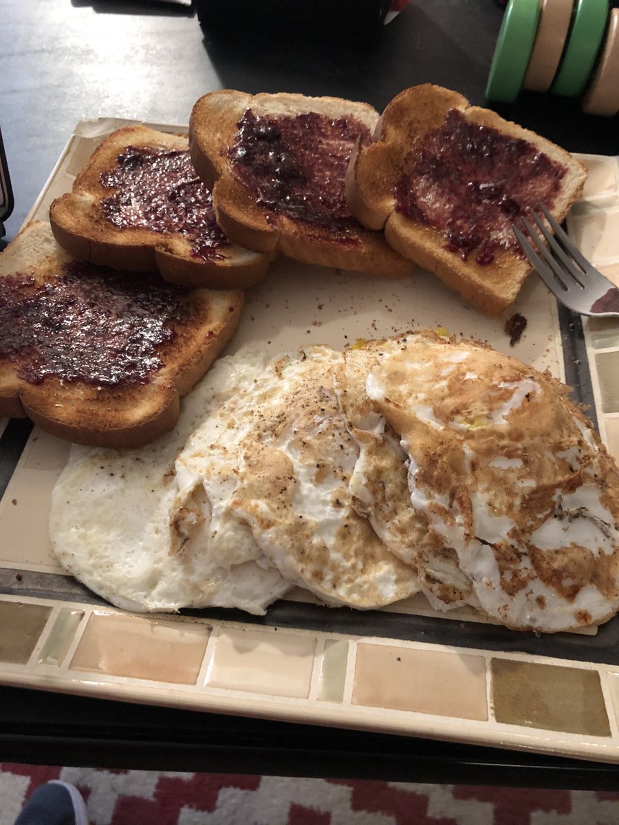 mr_greger's tweet photo. Breakfast of champions for office hours... over-easy eggs w/ jelly on toast.  Anyone else put the eggs on the bread? https://t.co/GKzLtnvGZF