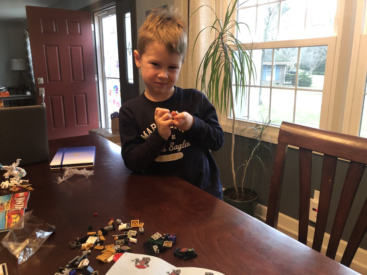 drkatiberg's tweet photo. The girls plugged away on their reading, writing and math assignments and Graham is already finished with 4K tasks so it’s LEGO building time. Humphrey just wants to be near us. Now it’s time for me to get to work @MUCollegeofComm @MarquetteU. #WorkFromHome #wearemarquette https://t.co/alOgnajzMP