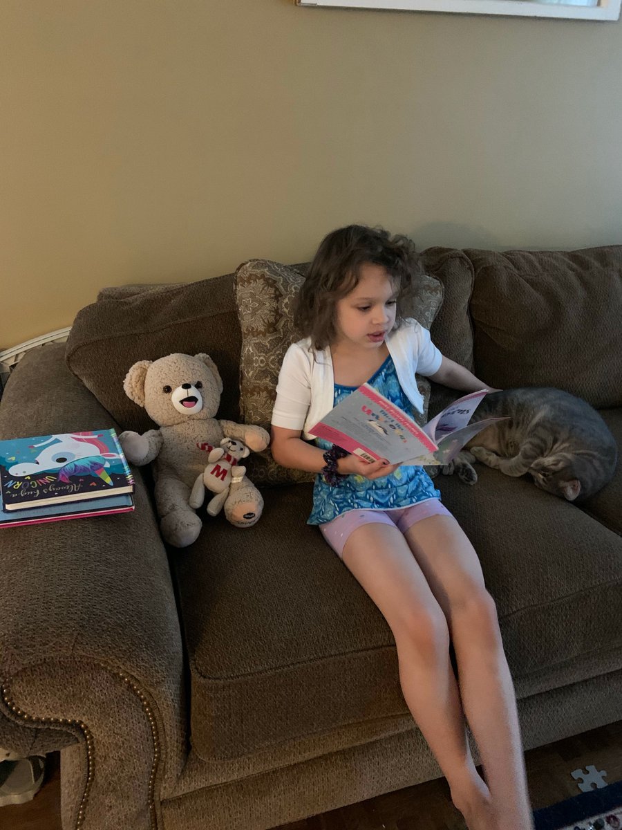 Madelyn doing some "Reading Bingo" by reading to her cat and her Teddy Bear on "Teddy Bear Tuesday". Thank you SouthSide for giving us such fun activities to do while we keep learning! #soutsidestrong #JCSALLIN