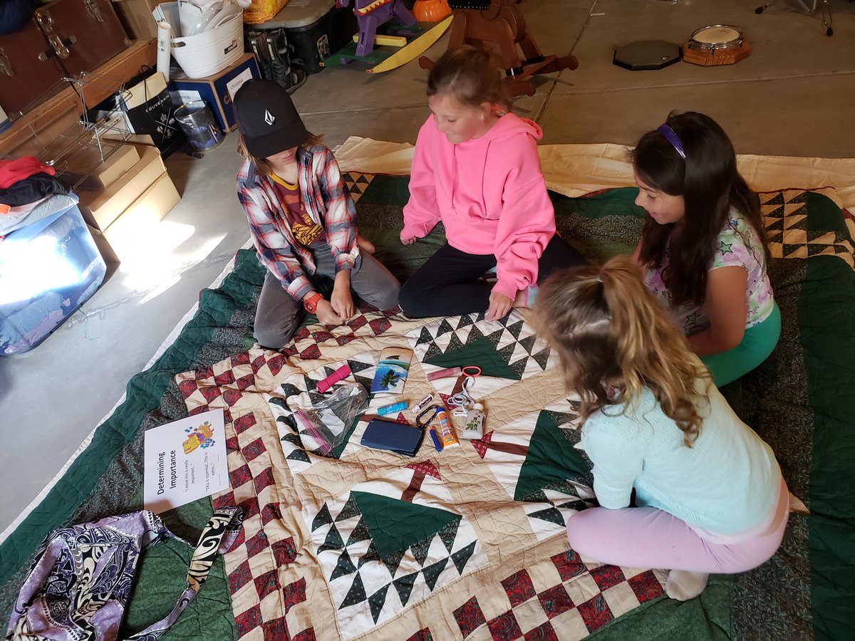 Determining importance today in our science lesson before reading about habitats. What would I take from my purse to the beach??