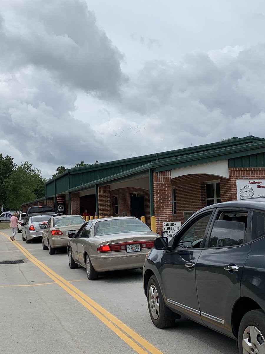 Parents and students picking up chrome books <a href="/AYEThoroughbred/">Anthony Elementary School</a>