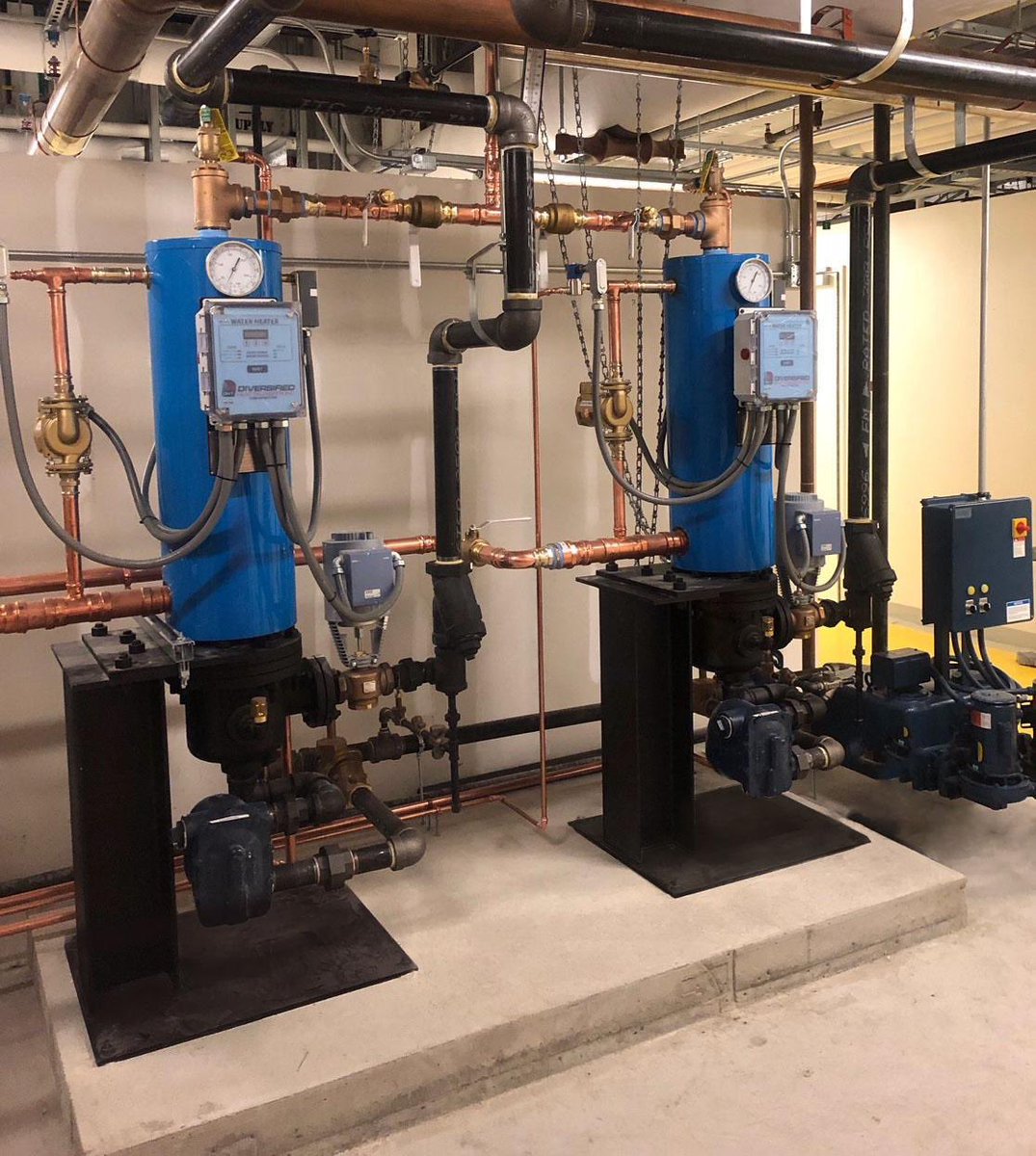 DiversifiedHeat's tweet photo. Recently DHT’s Manufacturer Rep, @NECombustion had (2) Vertical ST Series (SuperTherm) Water Heaters installed at a major teaching hospital in Boston, Massachusetts. The units serviced the domestic needs of all the lavatories, kitchens and offices. #waterheater #plumbing #dhtnet https://t.co/RW8NVvt0BS