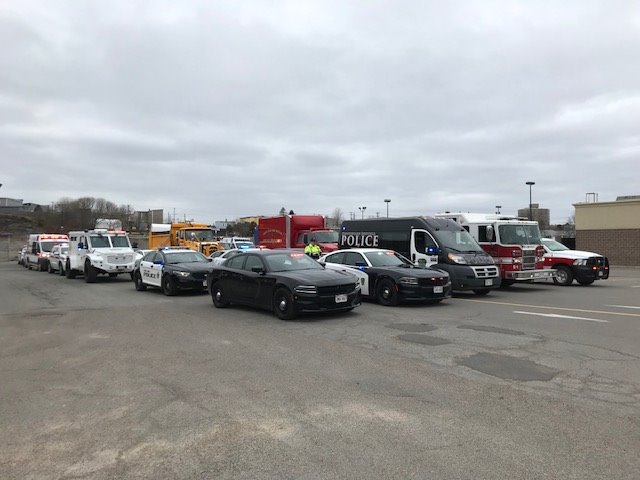 saintjohnpolice's tweet photo. Emergency personnel and essential services in GSJ pay tribute to health and front-line staff during the COVID-19 situation. Together, we ARE stronger. Take care of each other! Stay home so front-line and essential staff can continue to provide for you. @cityofsaintjohn https://t.co/n7Ovl1IiJr