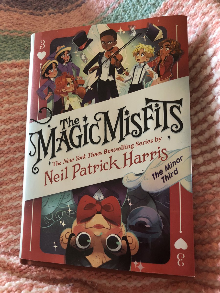 MrsPerkinsWAS's tweet photo. Iโm supposed to be on a beach reading this week, so instead Iโm reading on my couch! #magicmisfits @ActuallyNPH https://t.co/TmCiWWsLRZ