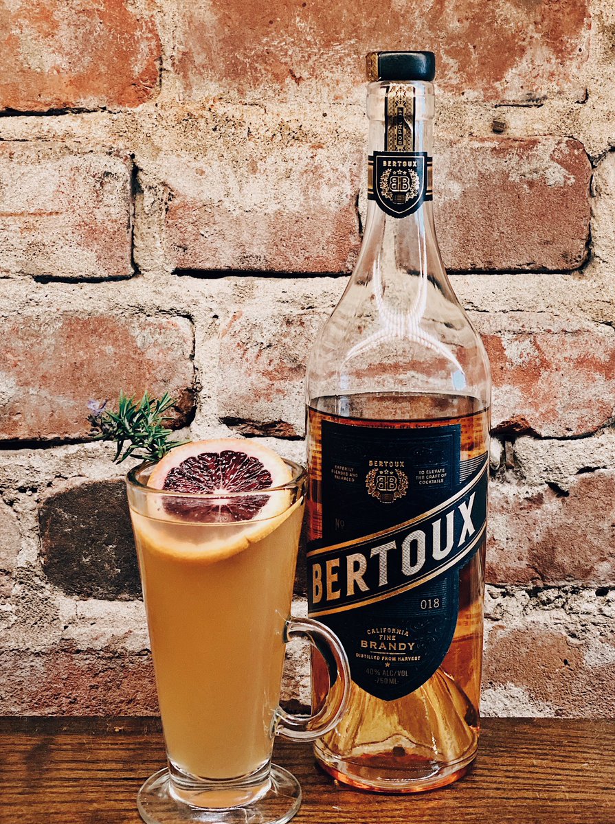 “Toddy for Toux” by Didi

2 oz <a href="/BertouxBrandy/">Bertoux Brandy</a> 
1 oz  orange juice
.5 oz honey lemon balm syrup

3 oz boiling hot water to top, stir until honey is dissolved. Garnish with a sprig of rosemary and a blood orange wheel. Cheers!