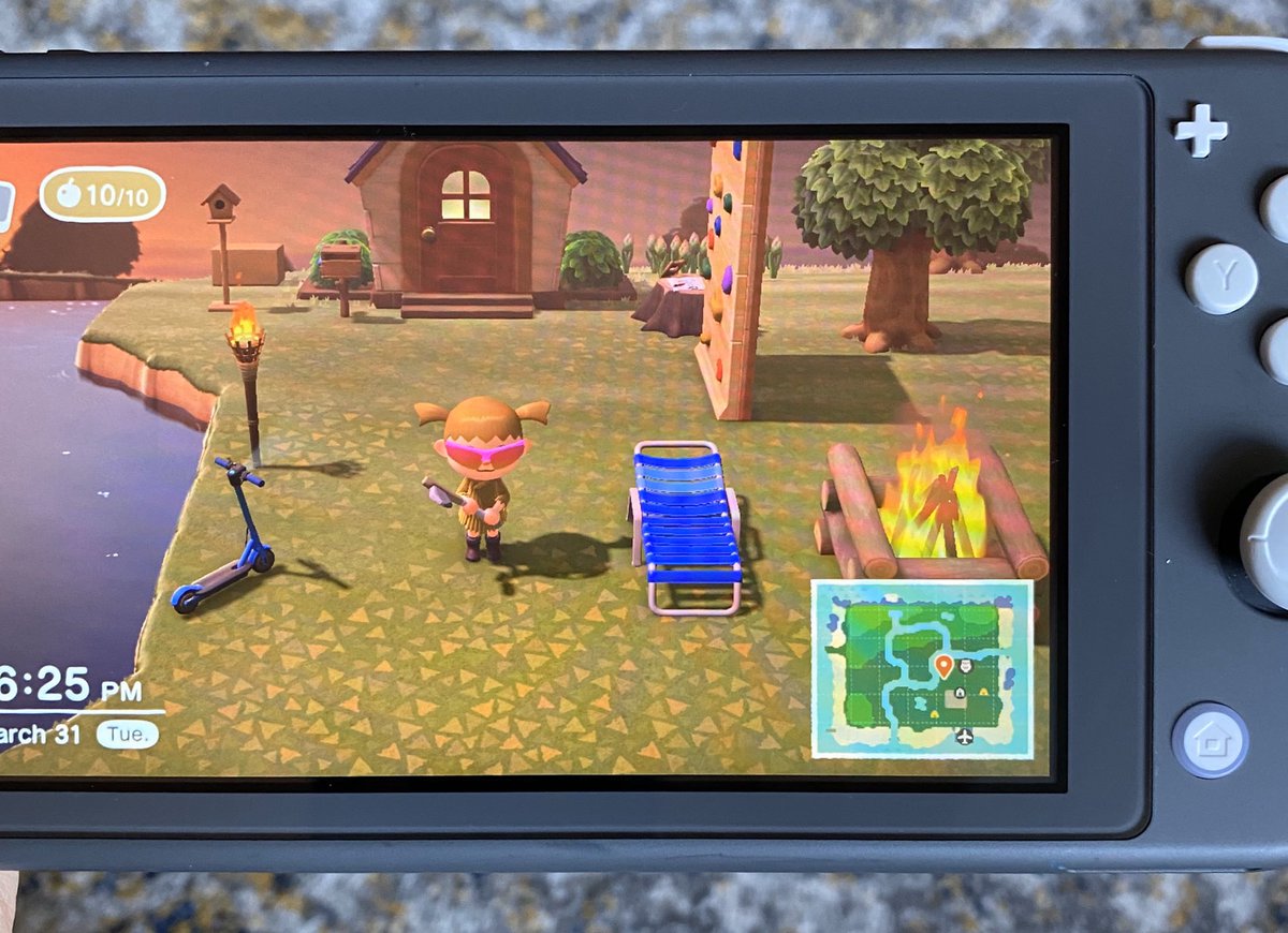 sometimeskelly's tweet photo. Quarantine vibes include: electric scooter, axe, rock wall, bonfire, and pink shades https://t.co/PJIyqJxxHS