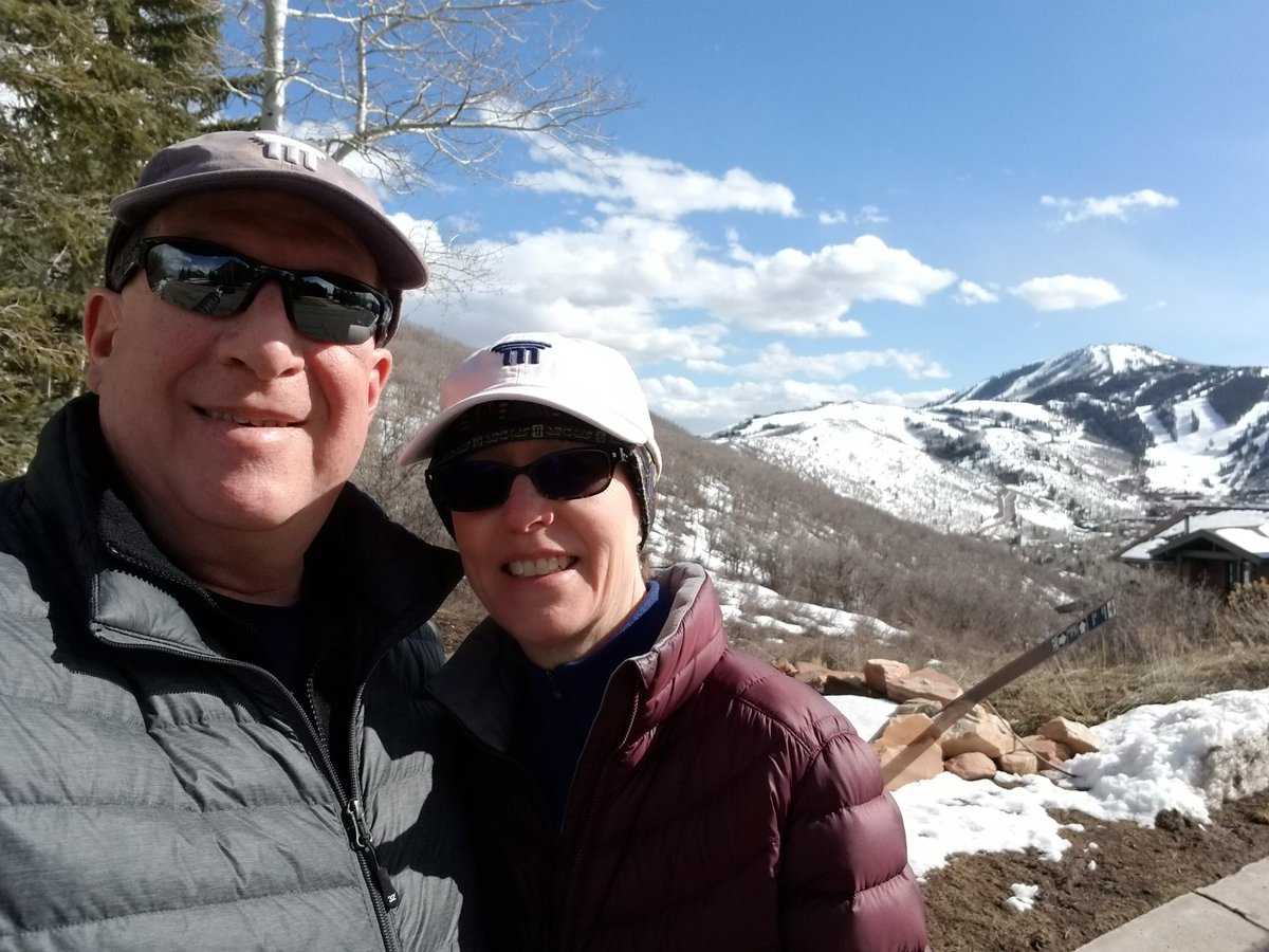 ScottAGreenberg's tweet photo. Out enjoying a bit of fresh air with my non-social-distancing spouse in our matching M Financial hats! Stay safe! #ShelterInPlace #SocialDistancing @MFinancialGroup https://t.co/10XKMJnXZ3