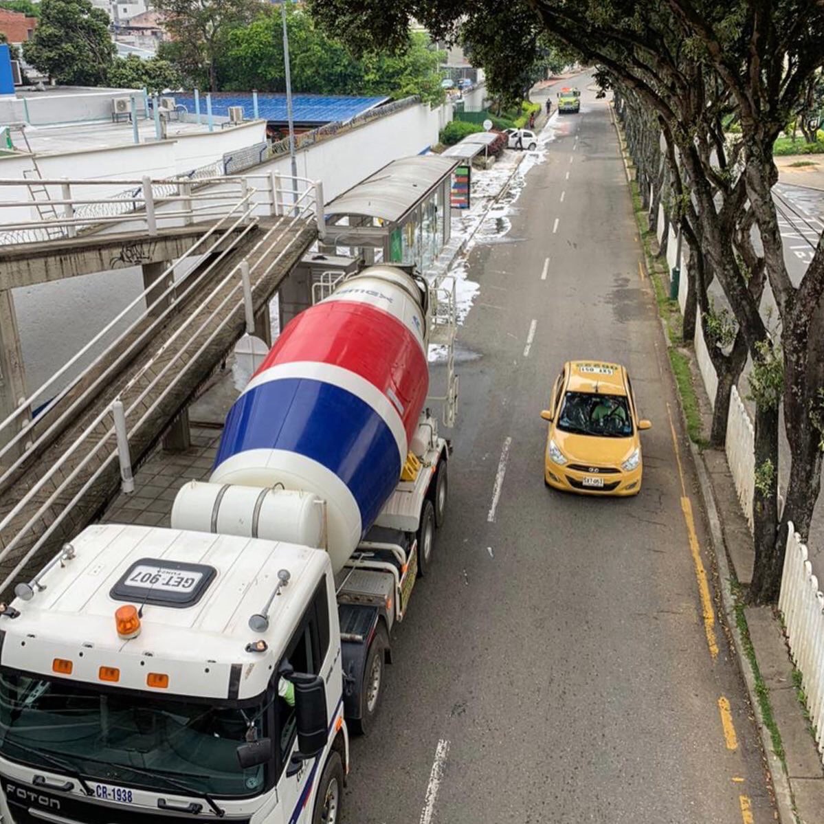 CEMEX's tweet photo. So... we did it again! Today, our mixers in Panama 🇵🇦 and Colombia 🇨🇴 delivered soap and water to sanitize areas for medical attention, plus other popular zones to help #FlattenTheCurve. https://t.co/hrKAI56Nk7