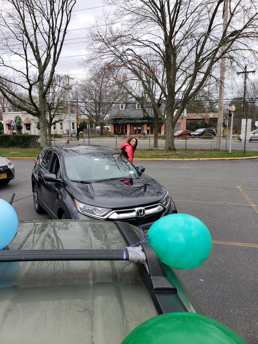 DebNovick's tweet photo. Teaching is emotional, but never as much as it was today. Faculty and staff came from all over to have a driving parade for our students. There were so many tears, smiles, cheers and signs with beautiful messages. I ❤️ my GWL/NS family. #pandemicteachers #distancelearning https://t.co/6zCkEif9i2