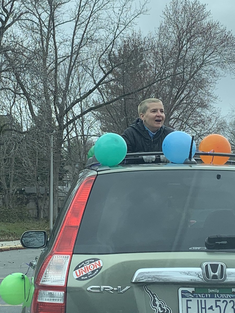 DebNovick's tweet photo. Teaching is emotional, but never as much as it was today. Faculty and staff came from all over to have a driving parade for our students. There were so many tears, smiles, cheers and signs with beautiful messages. I ❤️ my GWL/NS family. #pandemicteachers #distancelearning https://t.co/6zCkEif9i2