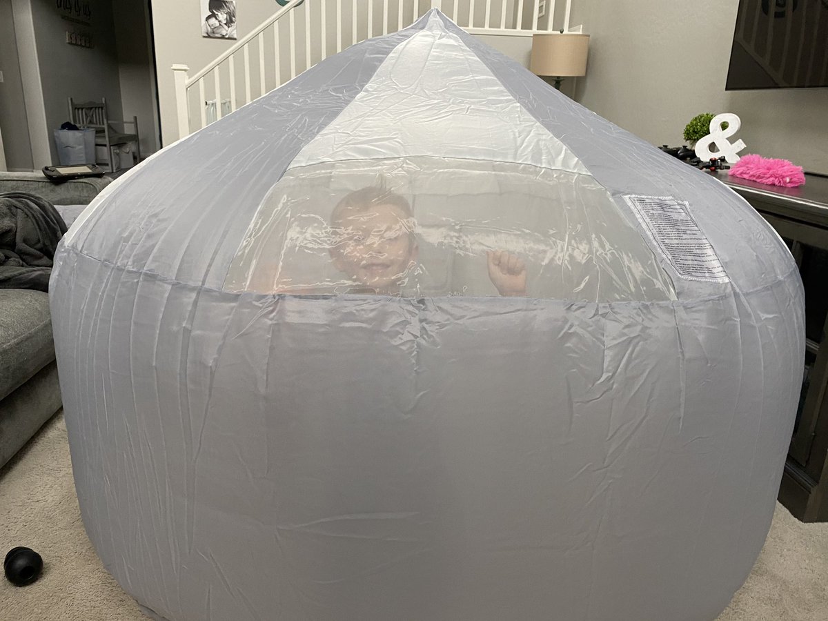 elizabetherwin's tweet photo. Parent COVID PSA: Need something to contain your tiny humans and give you a break from building pillow forts? I present, the best quarantine purchase to date. The Original AirFort Build A Fort in 30 Seconds, Inflatable for Kids, Gray/White https://t.co/yxR0re5tTq #NotAnAd https://t.co/a3mGxPXFwj