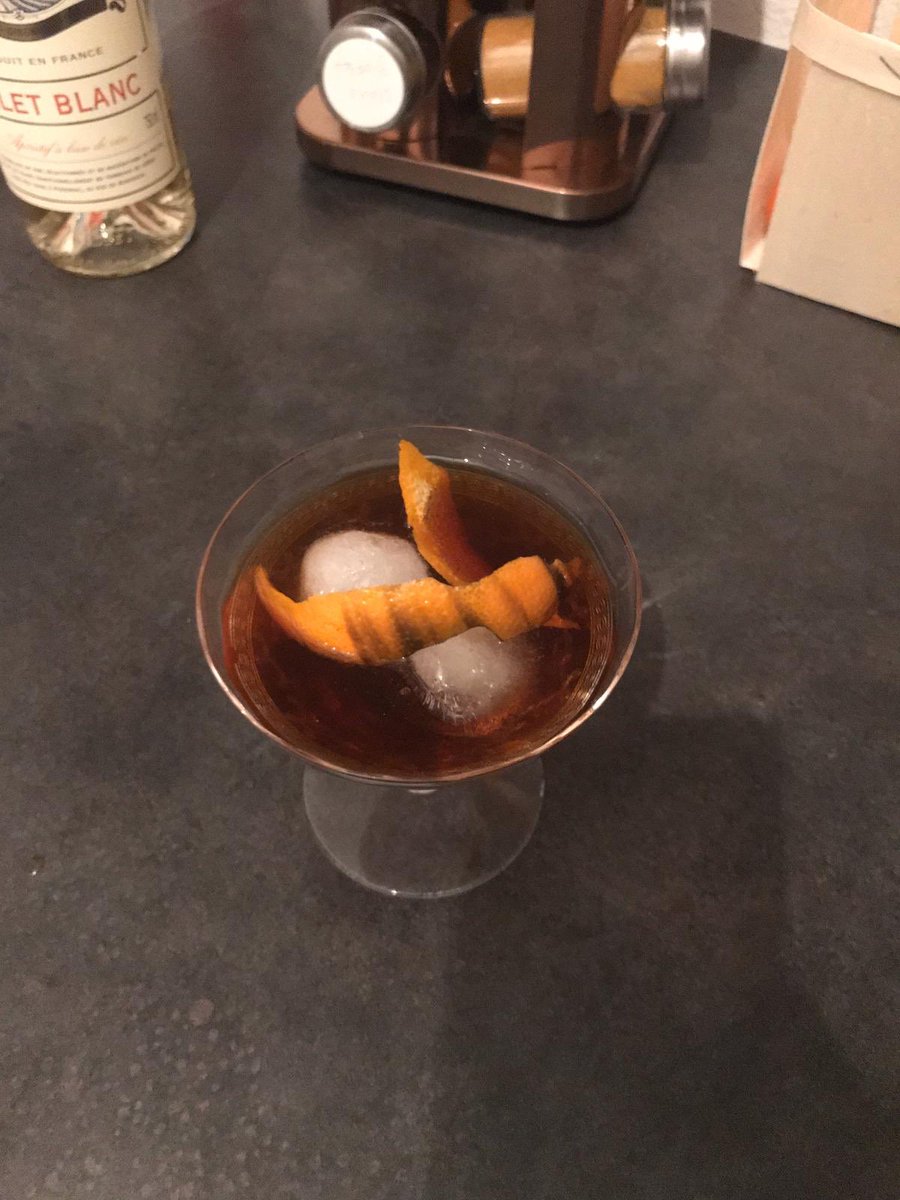 This made a pretty sweet cocktail, but with good flavors. Ramazotti is sweeter than Campari. So, she added ice to that mix, and a mandarin orange peel, lit on fire as she twisted it over the glass. Viable.