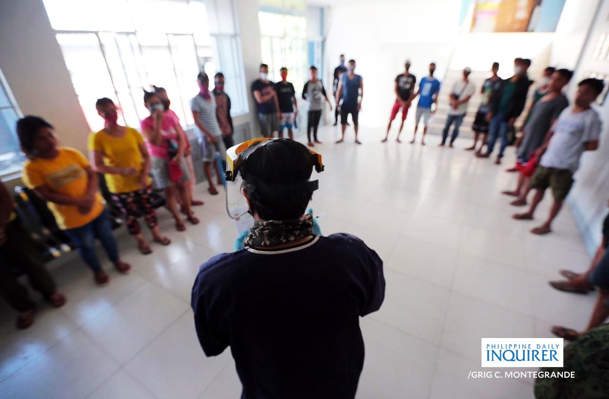 inquirerdotnet's tweet photo. LOOK: Police authorities at the PNP Station 10 in Kamuning, Quezon City initiates medical and inquest proceedings to 21 persons arrested on Wednesday, April 1, after mounting a protest in Sitio San Roque to demand food and government aid amid the ECQ.| ๐ทINQ/GRIG C. MONTEGRANDE https://t.co/SdjH7DaxL2