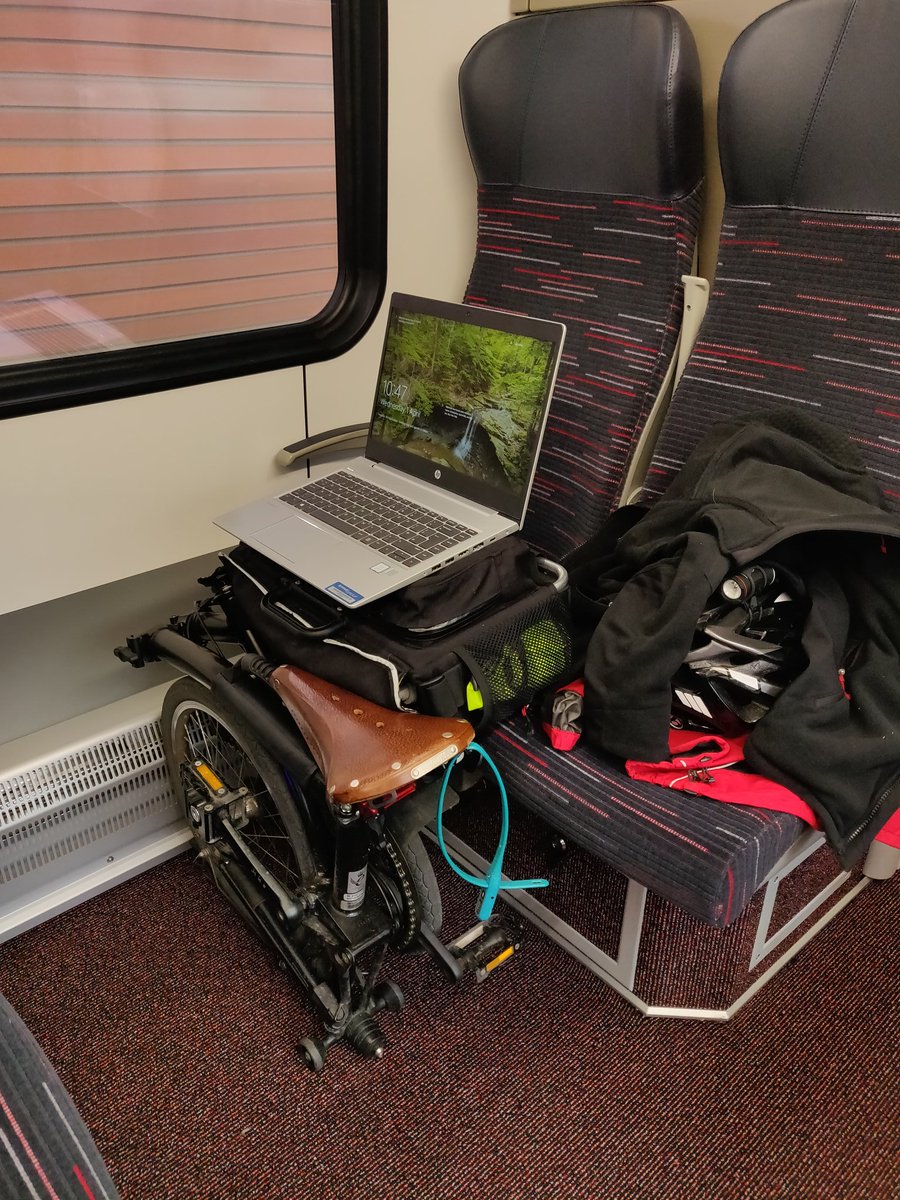 dickster0103's tweet photo. Thanks @greateranglia ..  no table to work at. Only chose to use the train to get to London so I can work on my journey rather than drive safely in my virus-free car. Make-shift desk and bad back awaits https://t.co/yMg07UgMgi