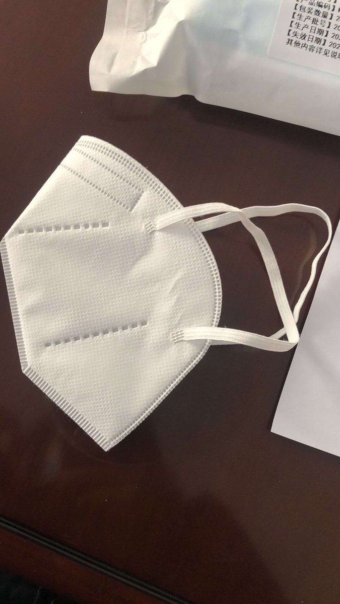 The Reason why it's advisable that the surgical masks shouldn't be re-used is because the Covid-19 virus can survive for as long as one week in the outer layer of the mask. (The clothing)