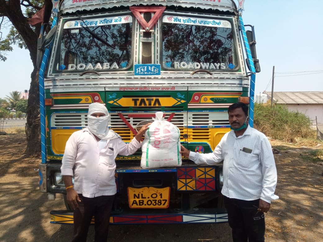 Paragsat's tweet photo. Supporting those in need, is of critical importance in these times. Proud of my team @BridgestoneInd for helping the stranded truckers with food supplies and sanitation kits as they remain confined to their vehicles due to lockdown. #OurWayToServe #WeAreBridgestone https://t.co/Jw5wHdwsm3