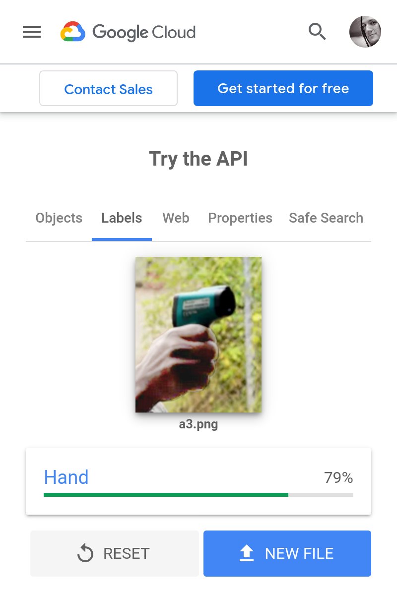 A crop of the original photo of the black person holding a thermometer, showing only the hand and device. This one has been (inexpertly) edited to lighten and recolour the person's skin to be a more pale complexion, but keeping some shading. The person's race is now somewhat ambiguous. Google's results say that it is 79% hand, only.