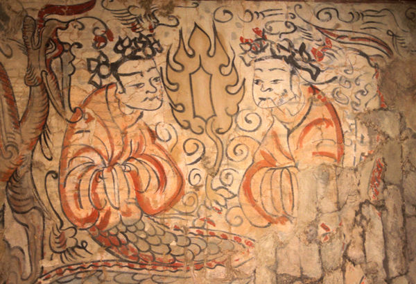 What is much more unusual is that instead of an astral body, like on the Astana banner, here they have a flame-enveloped gem on a lotus stem. This strongly resembles how the holy Buddhist Chintamani jewel is represented in the Yungang caves, as we see here in Cave 9. 8/9