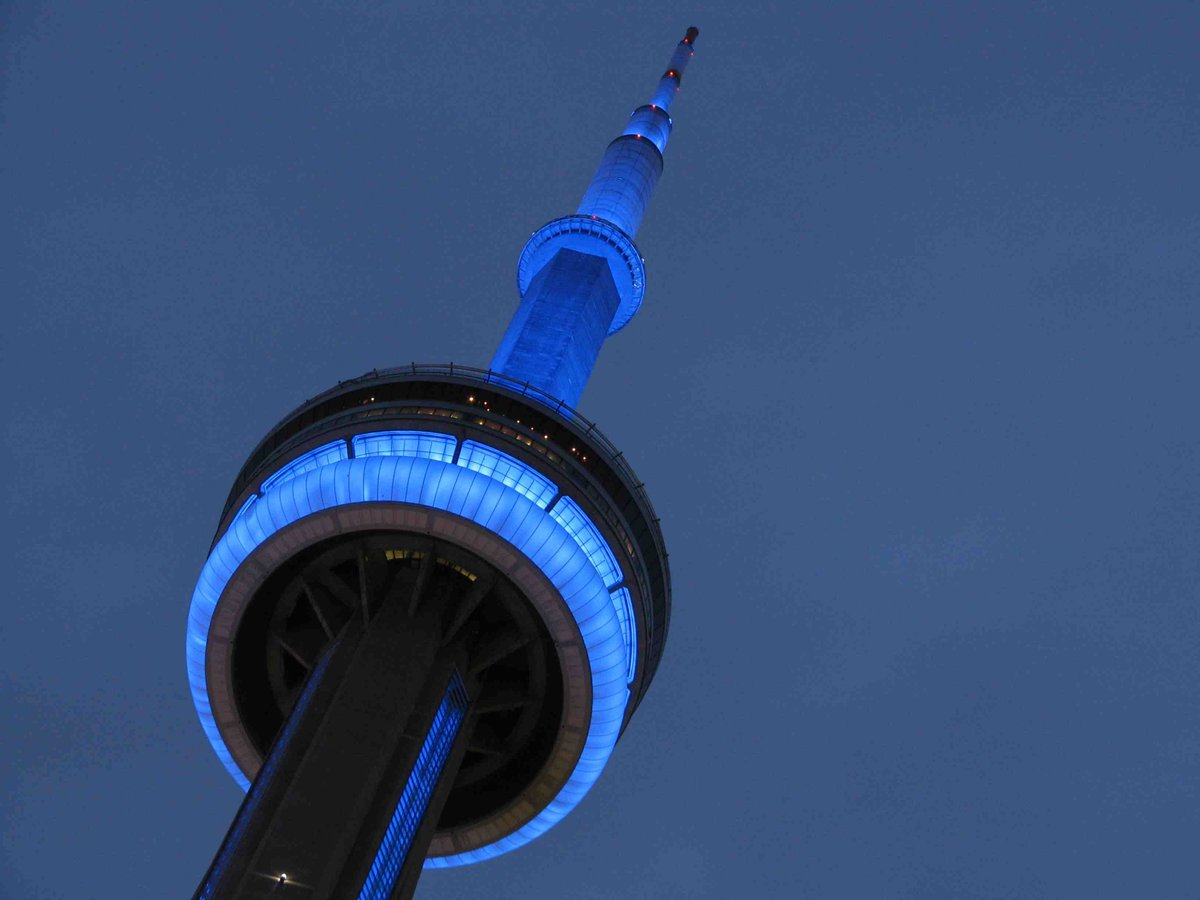 TourCNTower's tweet photo. 1/2 Starting tonight the CN Tower will be lit blue at the top of each hour in solidarity with health care and other essential workers who are working tirelessly to keep us safe. Watch for more to come soon. https://t.co/tiapGoGtzB