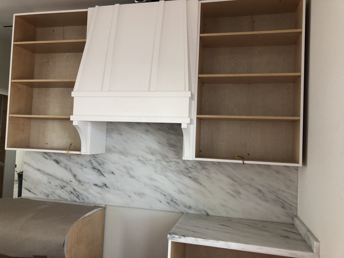 NelsonConstReno's tweet photo. Our Millwork Shop artisans at work building a custom oven hood. You can see the first phase in photo one and the second phase of installing it between custom cabinets in photo two.
#customovenhood #ovenhood #millwork #millworkshop #nelsonmillworkshop #customcabinets #designbuild https://t.co/PKMj4Tw3GJ