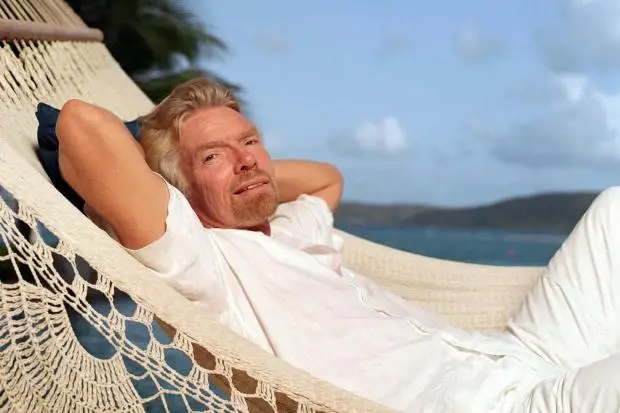 SaulStaniforth's tweet image. Branson owns an island in the Caribbean. I've never been to the Caribbean. He uses his island as a tax haven so his companies avoid paying tax. I pay my taxes. He sues the NHS. I rely on the NHS. Hes worth £4bn. I'm overdrawn. He wants me to help bail him out🤔#VirginAtlantic