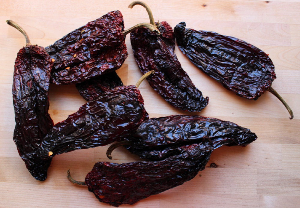 What is an ancho chile? It is one of the most popular dried chiles in Mexico and in Southwestern cuisine. This mild and earthy chile is extremely versatile and used as the base for many stews, sauces, and more. Learn More >> 
inmamamaggieskitchen.com/ancho-chile/