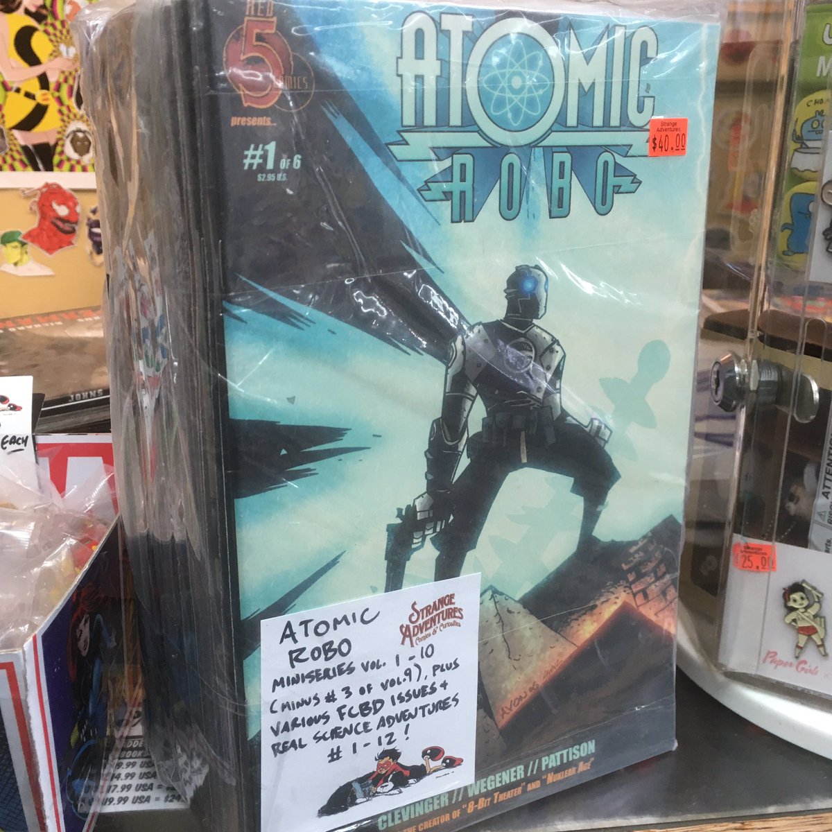 strangeadventrz's tweet photo. Fans of HELLBOY and robotsโdonโt sleep on this half-price bundle of #atomicrobo by #brianclevinger & #scottwegener, a decades-spanning adventure series with a heart of gold! Available now for curbside pickup or delivery! #betterasbackissues #quarantinecomics #readmorecomics https://t.co/2aW1l7IWJC