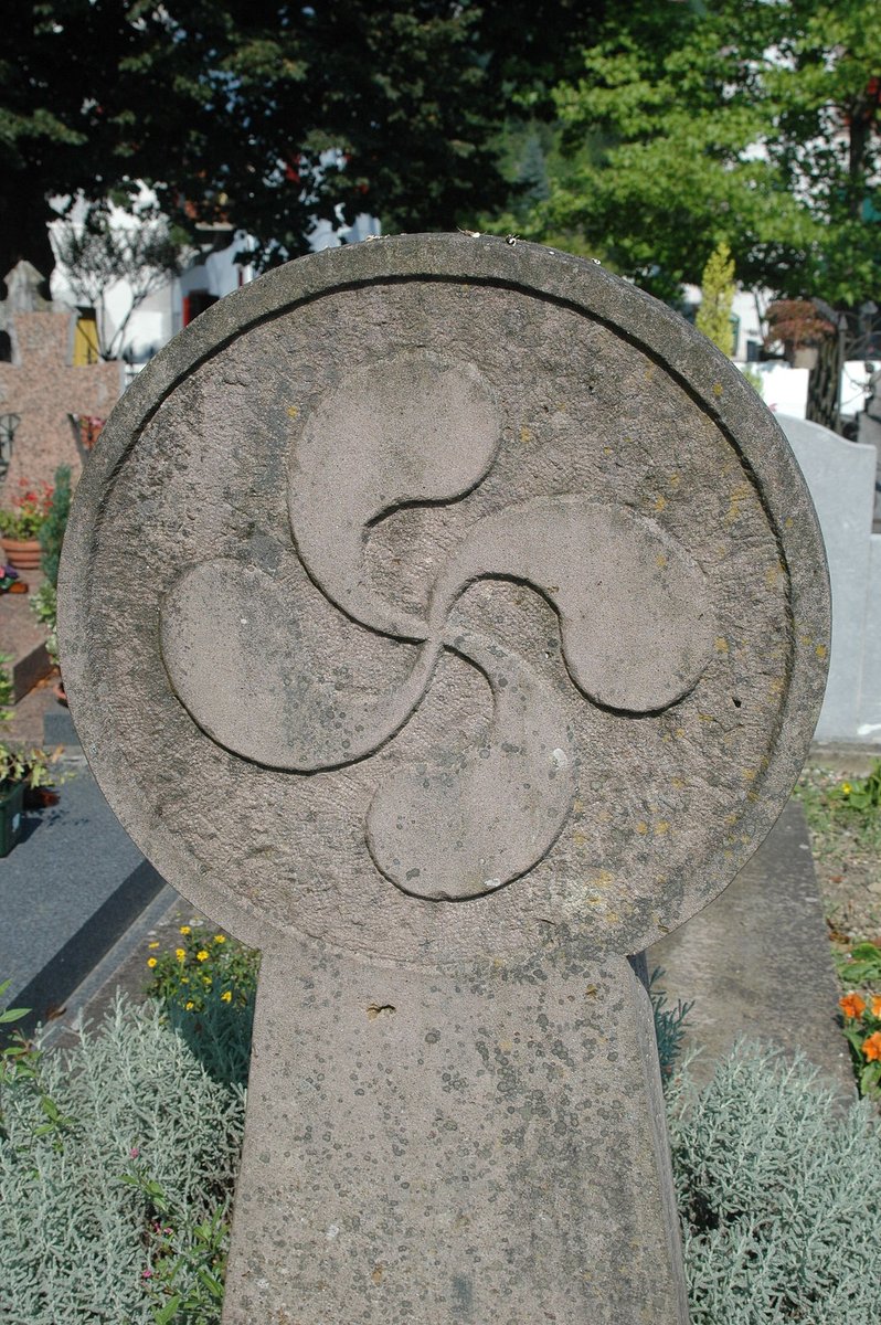 9/ In Basque Country, we have the very interesting Hilarri ("dead stone" in Euskera). They are round tombstones containing symbols of triskelions or the lauburu, the Basque swastika. Some date as late as the 20th century, meaning this tradition was carried over until modern times