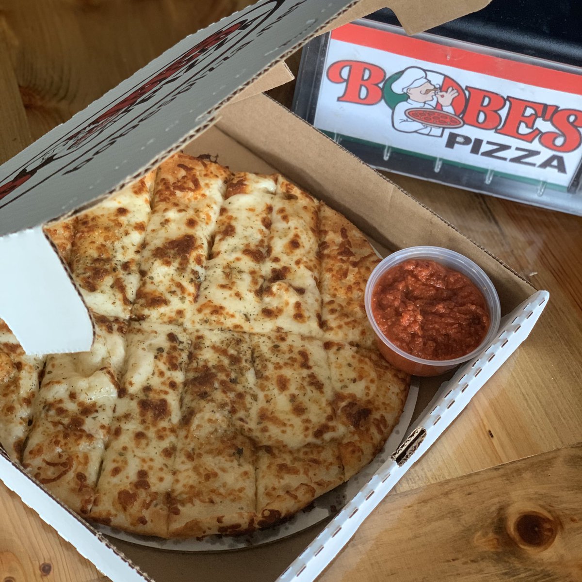 Bobe_Pizza's tweet photo. Governor Pritzker called. Apparently Garlic Cheese Sticks from Bobe’s are now considered “ESSENTIAL.” 🧐😅 https://t.co/PUuMurQbx4