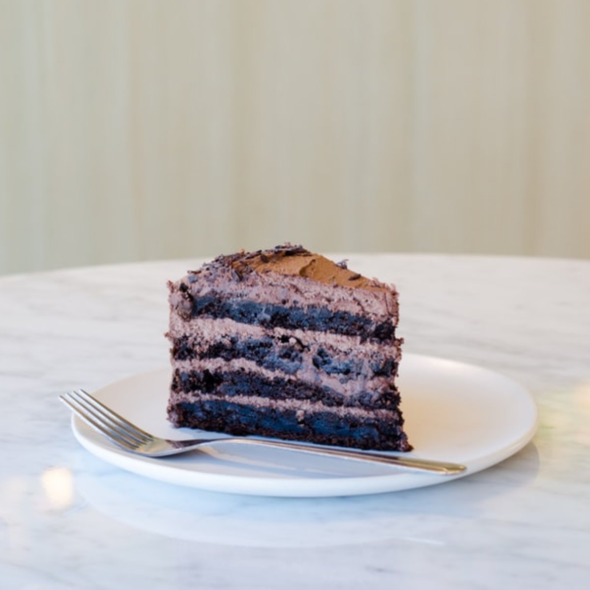 Take a break from work at home -- enjoy a slice of cake. Would you prefer chocolate or vanilla?