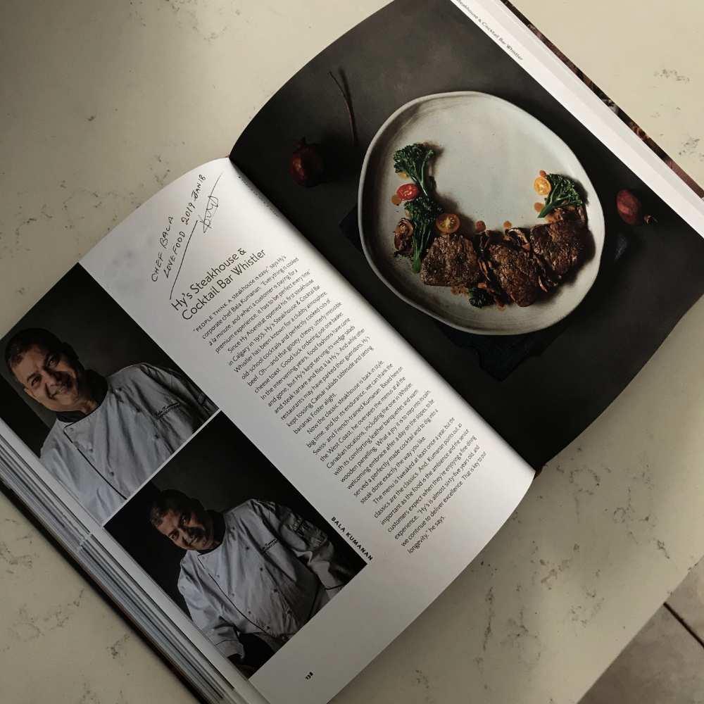 Hys_Steakhouse's tweet photo. Have a copy of Joanne Sasvari's "Vancouver Eats" cookbook? Check out pg 138 with Hy's Corporate Chef Bala Kumanan and the recipe for Filet a la Hy's. You'll find many fantastic recipes from YVR chefs to help satisfy cravings while safely social distancing. #cookathome https://t.co/K0uy2j3SlD