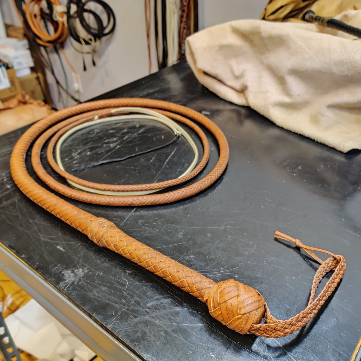 A fresh 1936 Indy whip. There are many diffrences between a 1936 Indy and a Modern Indy, but the easiest to spot is the leather tag around the wrist loop!

#Whip #Whips #LeatherWhip #LeatherCraft #workshop #LeatherWork #Indy #IndyV #IndianaJones #Indy5 #Bullwhip #IndyWhip