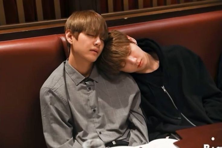 a rare photo of jungkook sleeping on taehyung's shoulder instead i'm