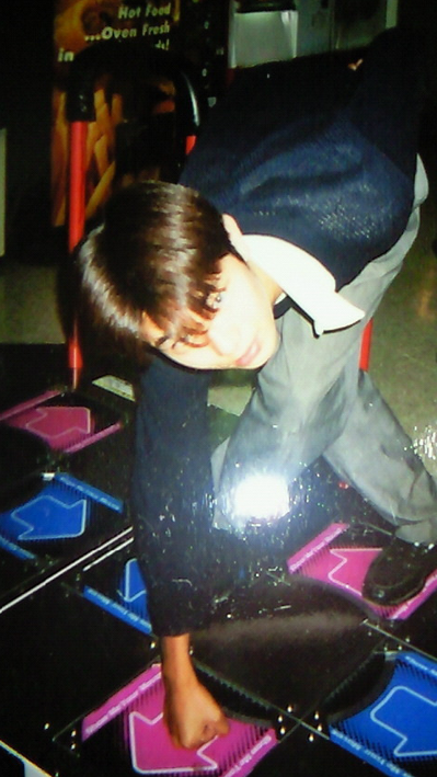 SBuzzbuzz's tweet image. ThrowbackThursday (in Seoul anyway) pic of me playing DDR in high school, badly (if you need to use all limbs you are probably not doing well):