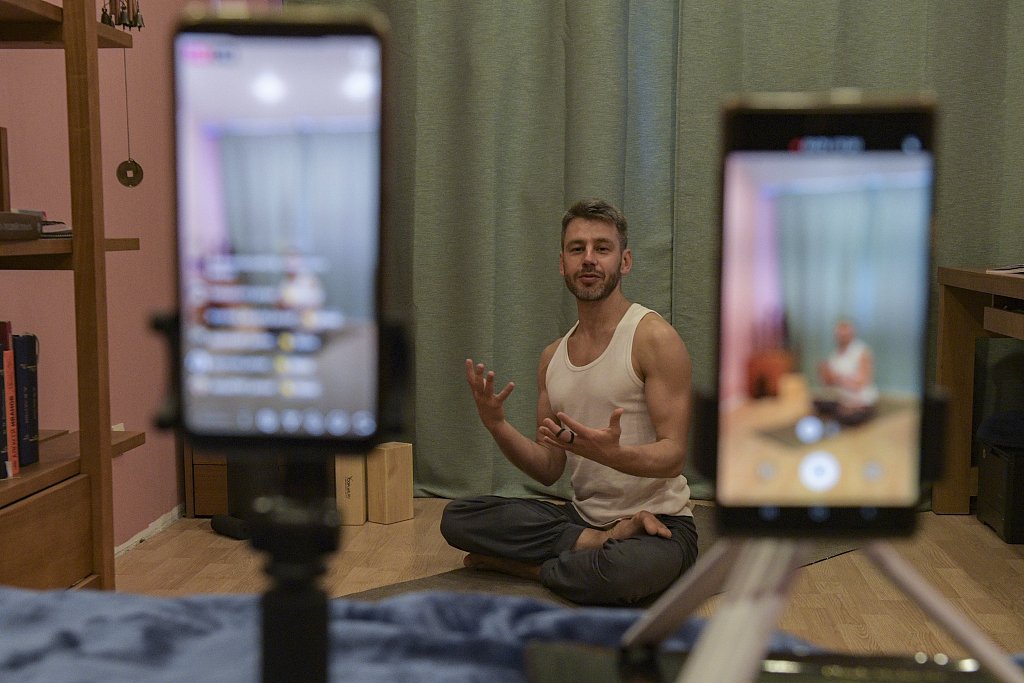 What are you doing to stay busy while practicing SocialDistancing? Russian yoga instructor