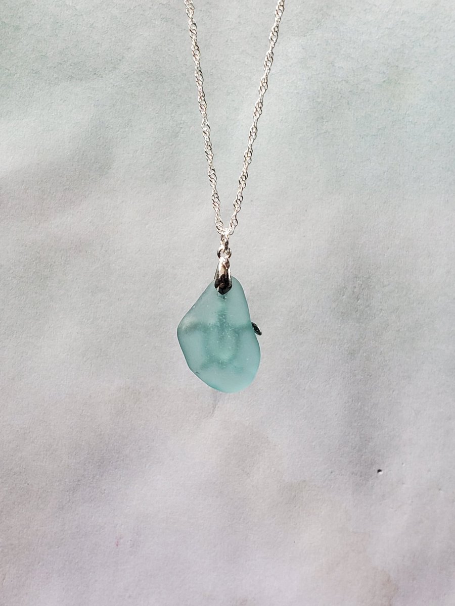 saltedbayonet's tweet photo. A sweet silver #seaturtle graces this #handmade, genuine aqua blue #seaglass &amp; sterling silver necklace.  https://t.co/sK8uhks7xX #seaglassjewelry #genuineseaglass #aquablue #aquablueseaglass #handmadejewelry #blueseaglass #seaturtlejewelry #surftumbled #seaglassnecklace https://t.co/s9zYvPVRbW