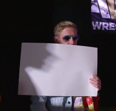 AEWonTV's tweet photo. Sign of the night? #AEWDynamite 🍊 https://t.co/CWr6r6GnZO