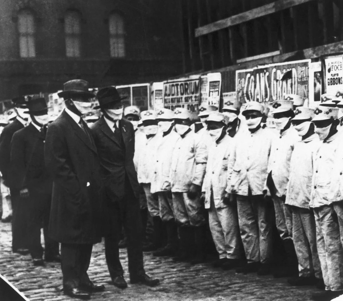 A few photos during Spanish flu in 1918. People had good judgment.  #Masks4AllOfficials checking cleaners wearing masks.1/9