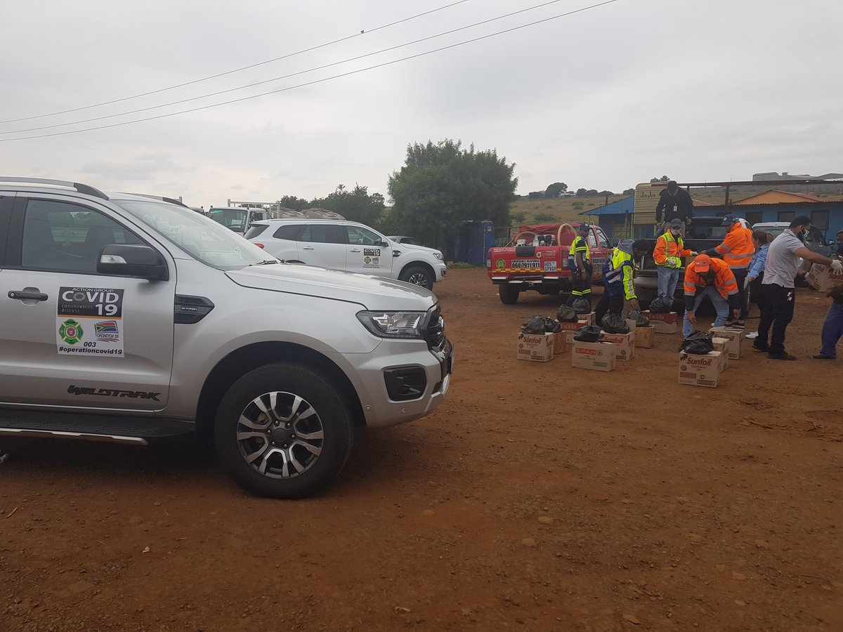 DMLaudium's tweet photo. The work must go on. Despite the false accusations by @TotalSAfrica Pilditch stadium and the constant harassment by security services. Laudium Disaster Management  distributing food to the homeless and residents of Iterelang. @TotalSAfrica @Abramjee @Lesufi https://t.co/57JrRJMUXm