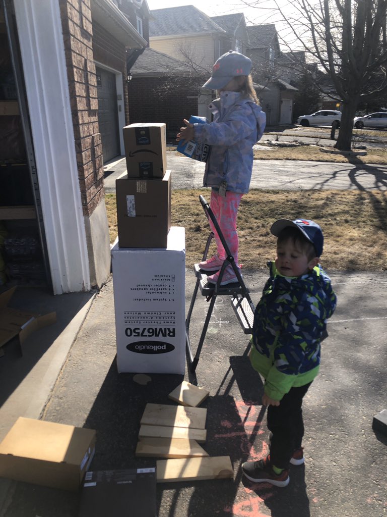 MrsSwansClass's tweet photo. For the STEM challenge today, we used boxes and the tower got so tall that we needed the big ladder and daddy to help! So proud of their finished product...but, the wind knocked it down right after this picture! #JamSpiritWeek @StJamesOCSB @k1kindergarten https://t.co/kcMxXcf0Yi